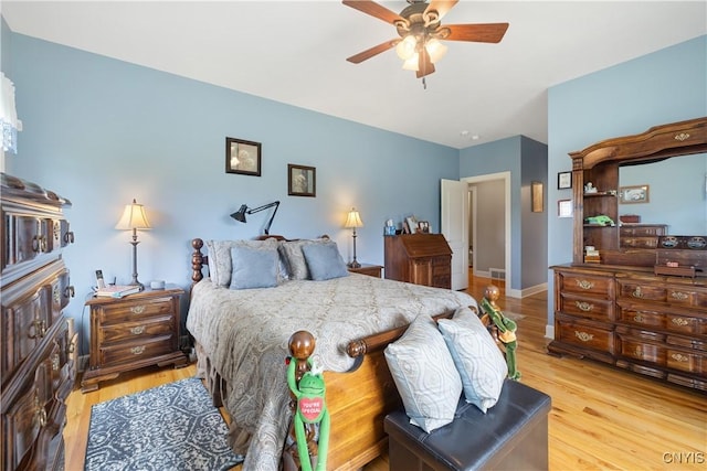 146 Edwards Falls Ln, Manlius, NY 13104 - bedroom with light wood-style floors, ceiling fan, and baseboards