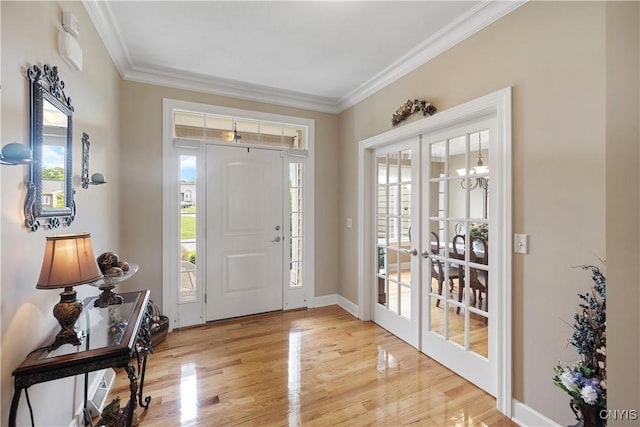 146 Edwards Falls Ln, Manlius, NY 13104 - foyer entrance with french doors, crown molding, light wood-style floors, and healthy amount of natural light