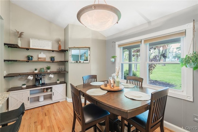 3616 E Genesee St Rd, Sennett, NY 13021 - dining area with vaulted ceiling, light wood-style flooring, and baseboards