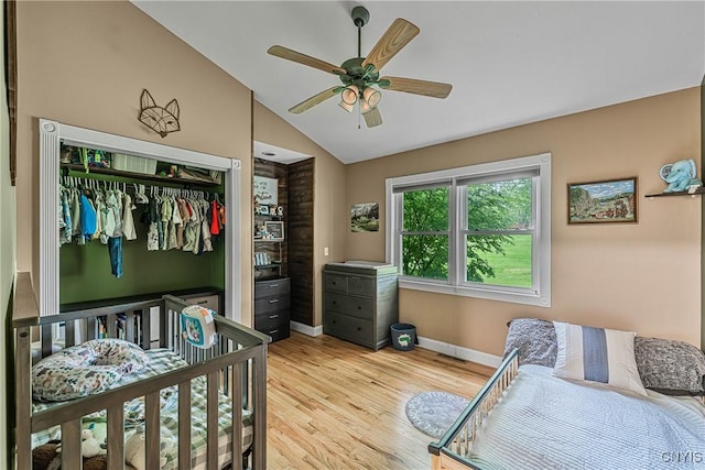 3616 E Genesee St Rd, Sennett, NY 13021 - bedroom featuring lofted ceiling, light wood-style flooring, a closet, baseboards, and ceiling fan