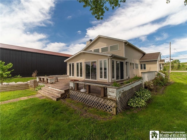 3973 Rte 430, Ellery, NY 14712 - back of property featuring a wooden deck, a yard, and a chimney
