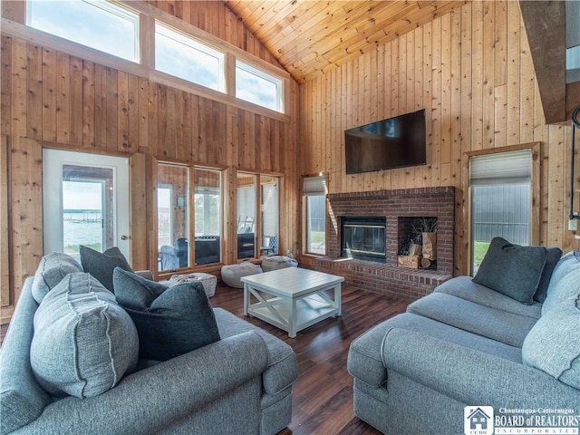 3973 Rte 430, Ellery, NY 14712 - living room with high vaulted ceiling, wooden walls, wood finished floors, a fireplace, and wooden ceiling