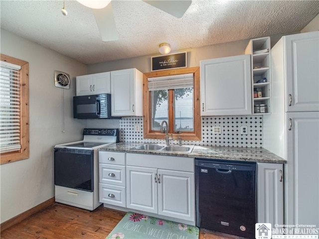 3973 Rte 430, Ellery, NY 14712 - kitchen featuring black appliances, dark wood-style flooring, white cabinetry, tasteful backsplash, and open shelves