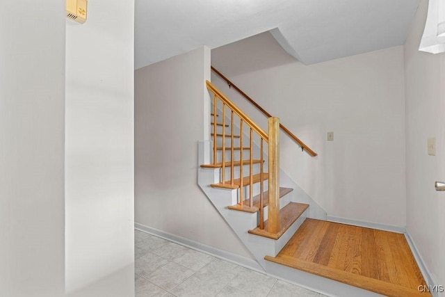 4155 Old Winding Way, Onondaga, NY 13215 - staircase with baseboards