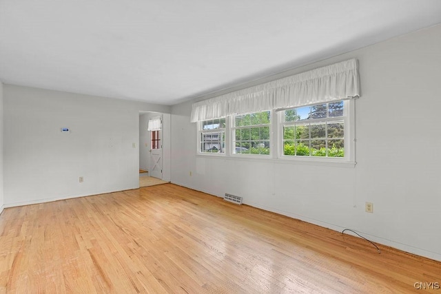 4155 Old Winding Way, Onondaga, NY 13215 - spare room featuring wood finished floors and baseboards