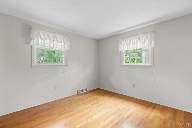 4155 Old Winding Way, Onondaga, NY 13215 - empty room with light wood finished floors and baseboards