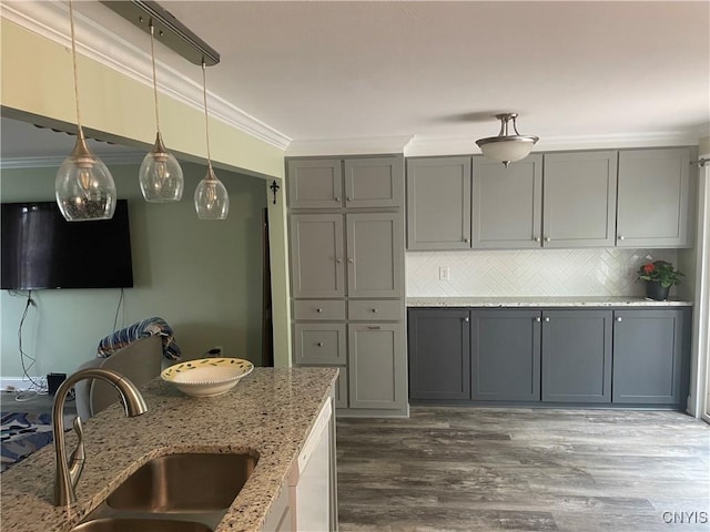 76 Windebank Ln, Manlius, NY 13116 - kitchen featuring a sink, gray cabinetry, dark wood-style flooring, tasteful backsplash, and light stone counters