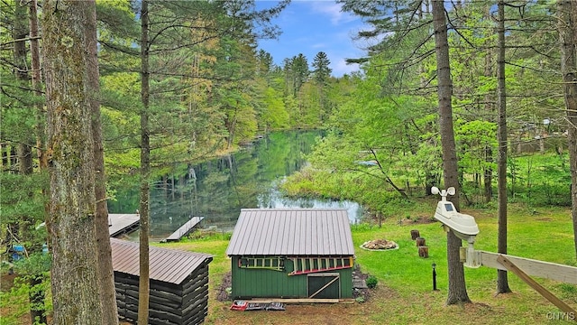 7678 N Shore Rd, Watson, NY 13343 - view of green lawn with a forest view