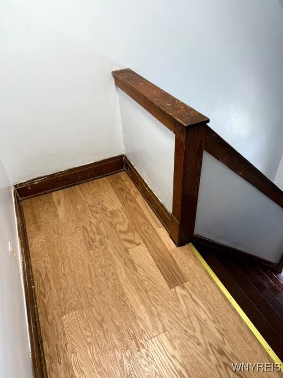 detailed view of wood finished floors and baseboards