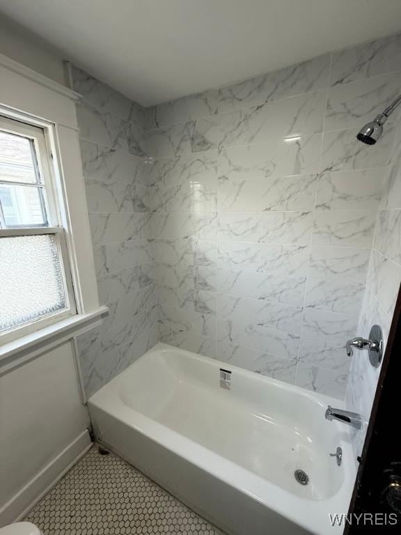 bathroom with shower / bathtub combination
