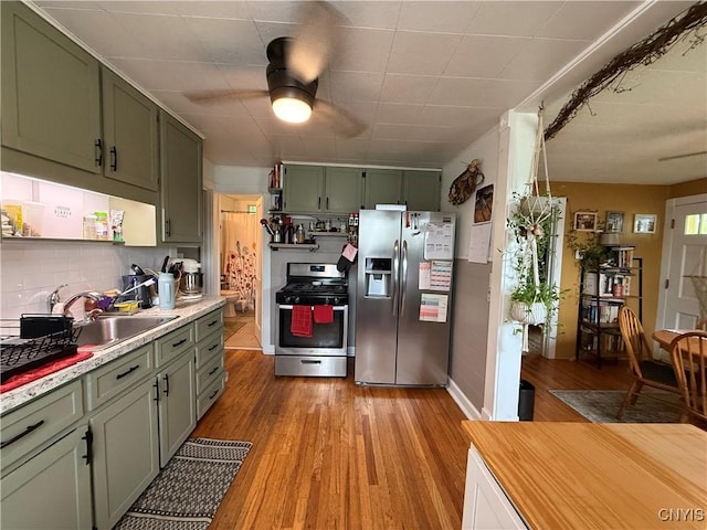 41 Young Ave, New Hartford, NY 13417 - kitchen with stainless steel appliances, open shelves, green cabinets, and a sink
