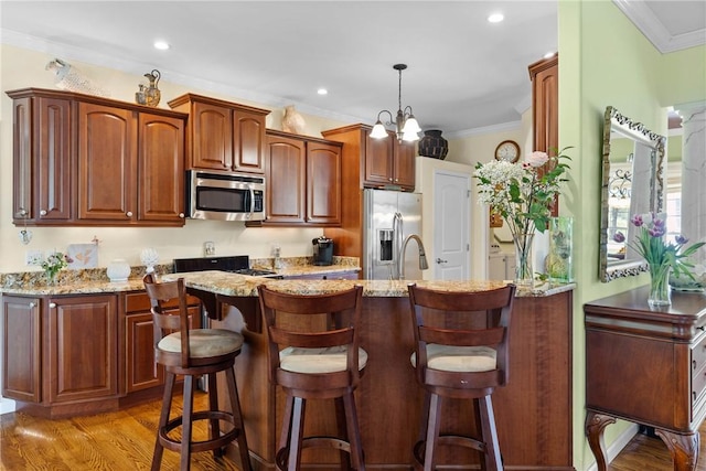 1619 Five Mile Ln Rd, Penfield, NY 14526 - kitchen featuring stainless steel appliances, light stone counters, light wood finished floors, a breakfast bar, and ornamental molding