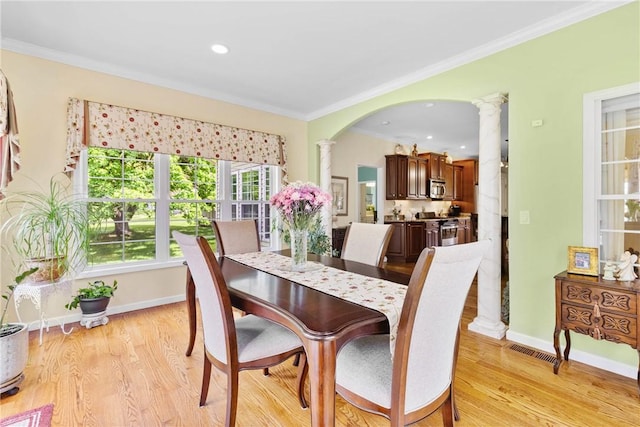1619 Five Mile Ln Rd, Penfield, NY 14526 - dining space with decorative columns, ornamental molding, light wood-type flooring, baseboards, and recessed lighting