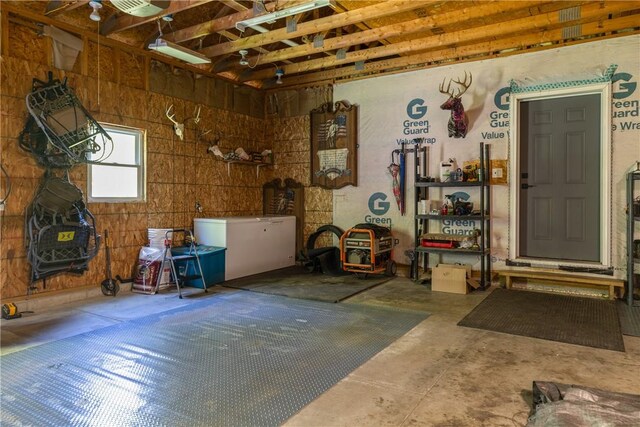 2208 Davis Rd, Corning, NY 14830 - garage featuring a garage door opener