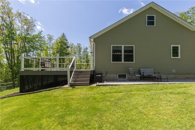 2208 Davis Rd, Corning, NY 14830 - back of house with a patio area, a wooden deck, and a yard