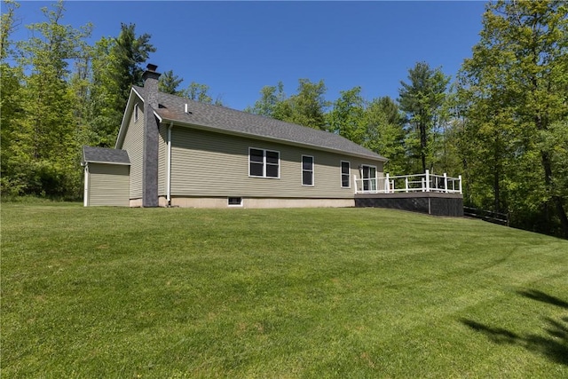2208 Davis Rd, Corning, NY 14830 - rear view of property featuring a chimney, a lawn, and a wooden deck