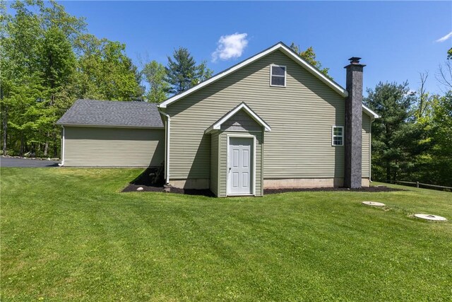 2208 Davis Rd, Corning, NY 14830 - rear view of house with a chimney and a yard