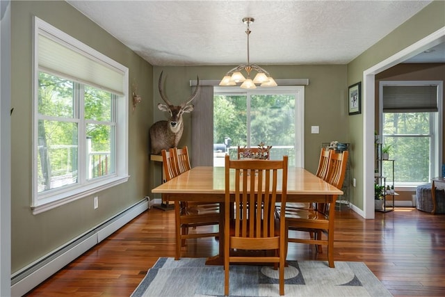 2208 Davis Rd, Corning, NY 14830 - dining room featuring baseboard heating, a chandelier, plenty of natural light, and a textured ceiling
