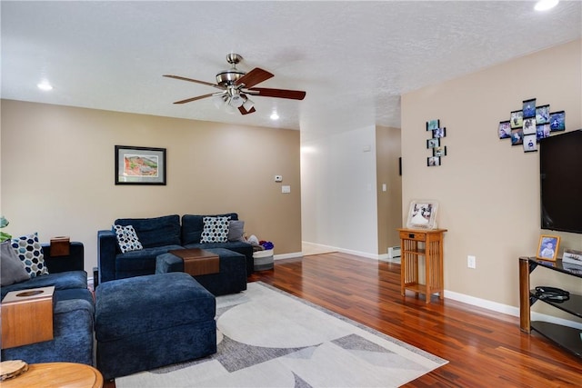 2208 Davis Rd, Corning, NY 14830 - living room featuring wood finished floors, a ceiling fan, baseboards, and recessed lighting