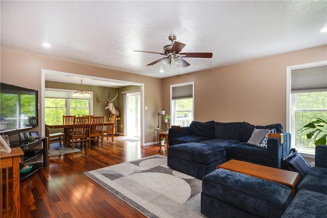 2208 Davis Rd, Corning, NY 14830 - living room featuring dark wood finished floors, ceiling fan, recessed lighting, and a chandelier