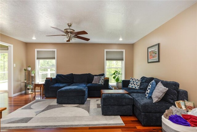 2208 Davis Rd, Corning, NY 14830 - living room with wood finished floors, plenty of natural light, ceiling fan, baseboards, and recessed lighting