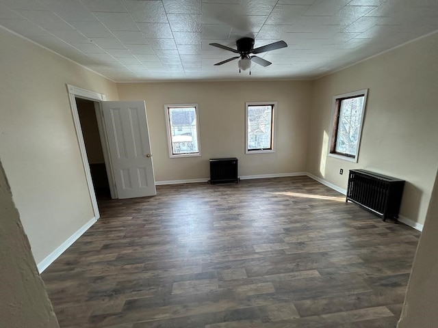 232 Birchwood Ave, Horseheads, NY 14903 - unfurnished living room with ceiling fan, dark wood-style floors, and baseboards