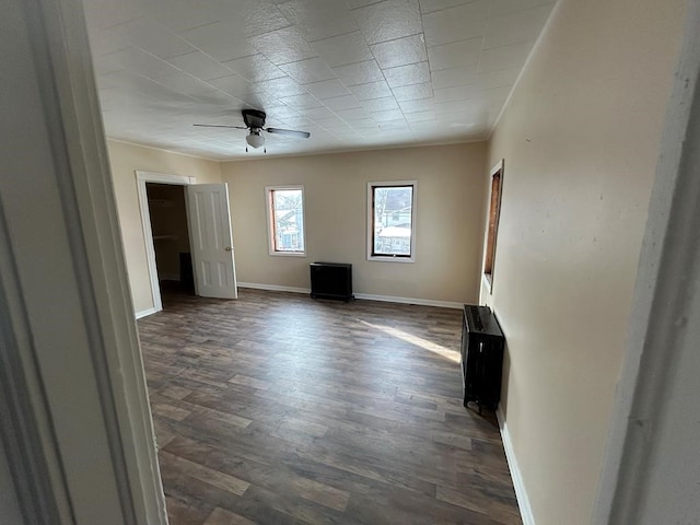 232 Birchwood Ave, Horseheads, NY 14903 - spare room with a ceiling fan, dark wood-type flooring, baseboards, and ornamental molding