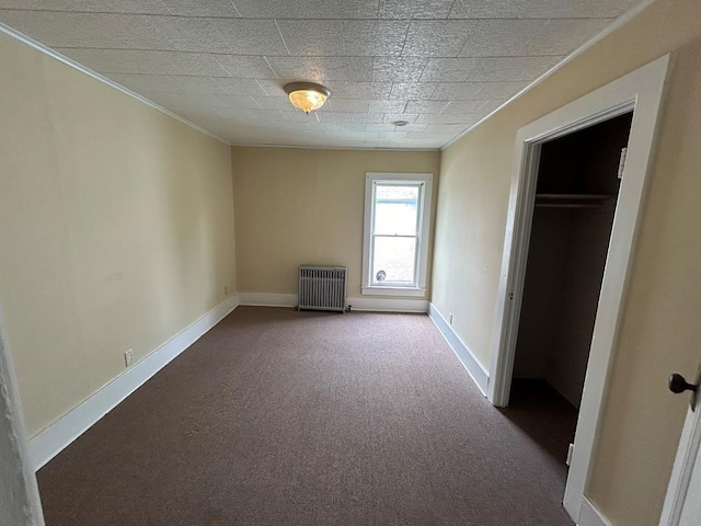 237 Scottwood Ave, Horseheads, NY 14903 - unfurnished bedroom featuring radiator, crown molding, carpet, and baseboards