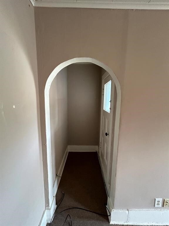 237 Scottwood Ave, Horseheads, NY 14903 - corridor featuring arched walkways and dark colored carpet