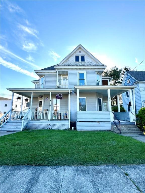 237 Scottwood Ave, Horseheads, NY 14903 - view of front of home with a porch and a front lawn