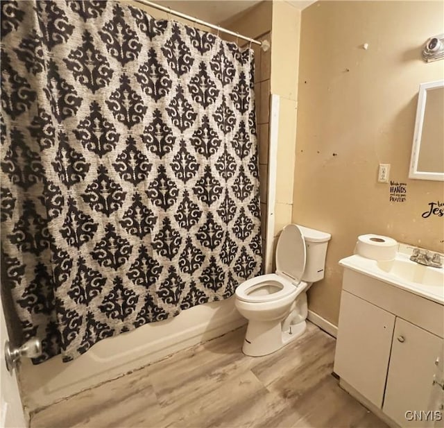 308 Rowland St, Syracuse, NY 13204 - bathroom with toilet, wood finished floors, curtained shower, and vanity