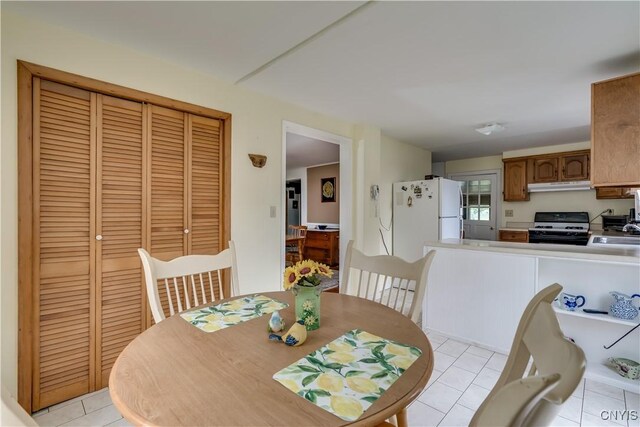 485 E Joseph St, Cape Vincent, NY 13618 - dining space featuring light tile patterned flooring