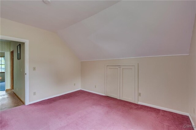485 E Joseph St, Cape Vincent, NY 13618 - additional living space with baseboards, vaulted ceiling, and carpet