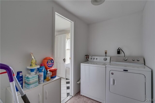 485 E Joseph St, Cape Vincent, NY 13618 - laundry room featuring washing machine and dryer and cabinet space