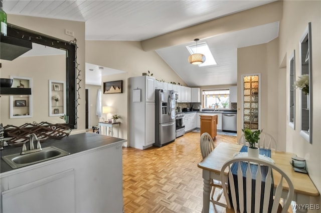 47 Acacia Dr, Amherst, NY 14228 - kitchen with appliances with stainless steel finishes, a sink, pendant lighting, and tasteful backsplash
