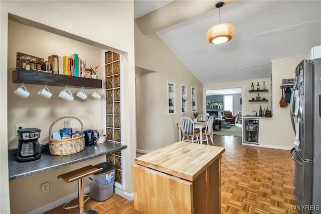 47 Acacia Dr, Amherst, NY 14228 - kitchen with freestanding refrigerator, baseboards, beverage cooler, butcher block counters, and open shelves