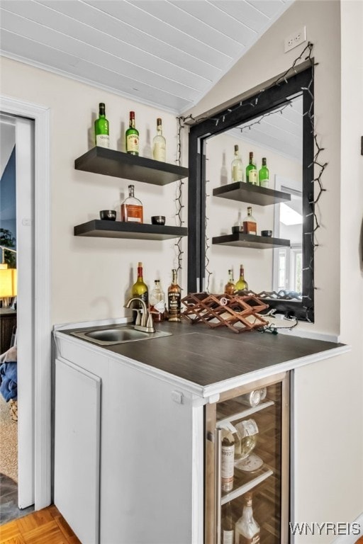 47 Acacia Dr, Amherst, NY 14228 - indoor wet bar featuring vaulted ceiling