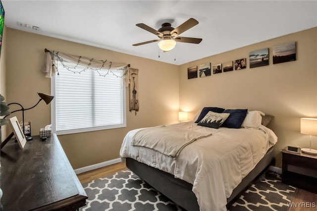 47 Acacia Dr, Amherst, NY 14228 - bedroom featuring wood finished floors, baseboards, and a ceiling fan