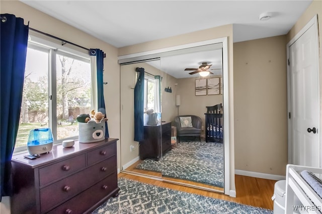 47 Acacia Dr, Amherst, NY 14228 - bedroom with wood finished floors, a closet, and baseboards