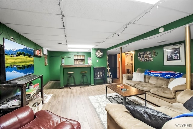 47 Acacia Dr, Amherst, NY 14228 - living area featuring a dry bar, wood finished floors, and rail lighting
