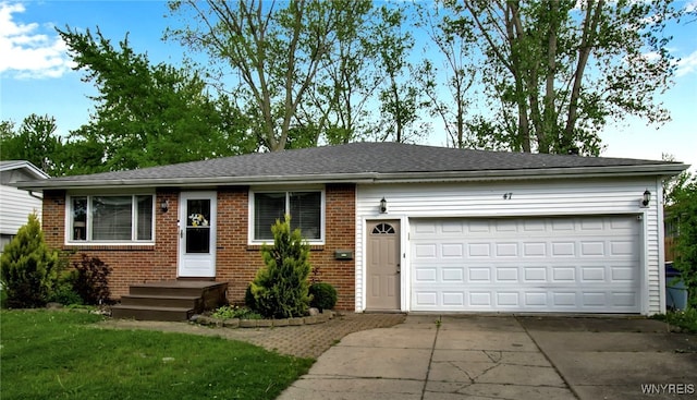47 Acacia Dr, Amherst, NY 14228 - view of front of house featuring brick siding, concrete driveway, a garage, and a front yard