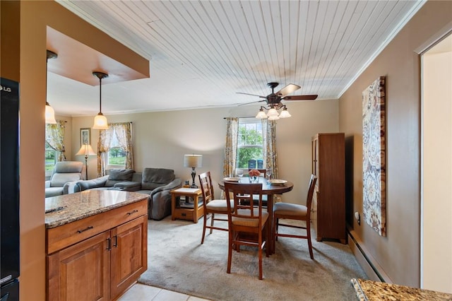 2600 Lake Rd, Ontario, NY 14519 - dining space with a baseboard radiator, ornamental molding, a ceiling fan, light carpet, and wooden ceiling