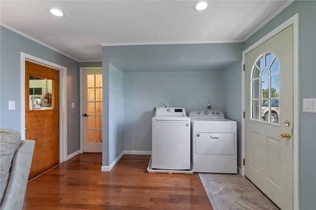 2600 Lake Rd, Ontario, NY 14519 - laundry room with washing machine and dryer, crown molding, baseboards, recessed lighting, and light wood-style floors