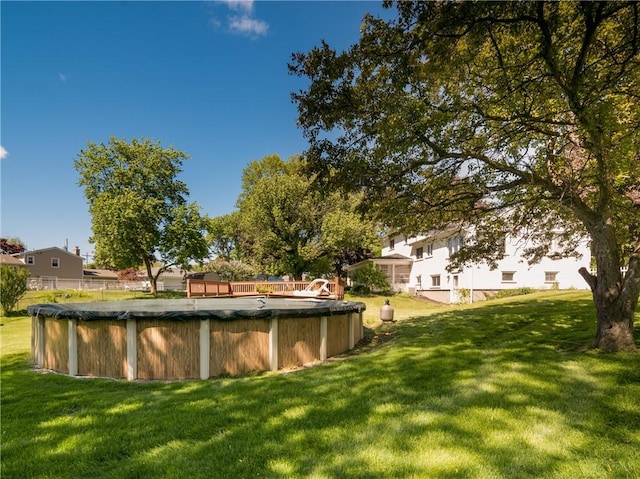 28 Kernwood Dr, Gates, NY 14624 - view of green lawn featuring a covered pool