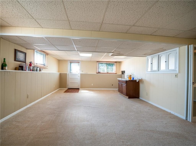 28 Kernwood Dr, Gates, NY 14624 - basement featuring a drop ceiling, light carpet, and baseboards