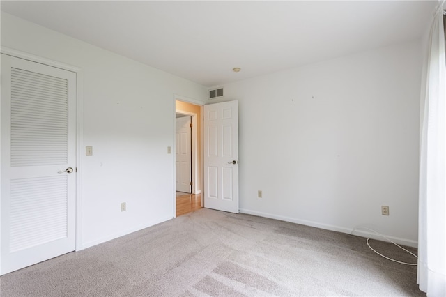 15 Stag Creek Trl, Clarkson, NY 14420 - unfurnished bedroom with light carpet and baseboards