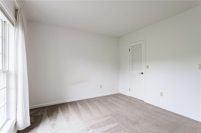 15 Stag Creek Trl, Clarkson, NY 14420 - carpeted empty room with baseboards