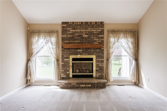 15 Stag Creek Trl, Clarkson, NY 14420 - unfurnished living room featuring carpet, plenty of natural light, and baseboards
