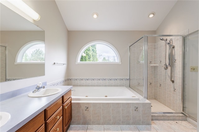 15 Stag Creek Trl, Clarkson, NY 14420 - full bath with healthy amount of natural light, a stall shower, a tub with jets, and double vanity