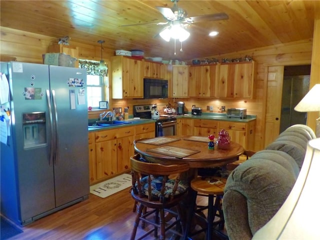 2693 Pulver Rd, Italy, NY 14418 - kitchen with appliances with stainless steel finishes, a sink, wooden ceiling, wood finished floors, and a ceiling fan